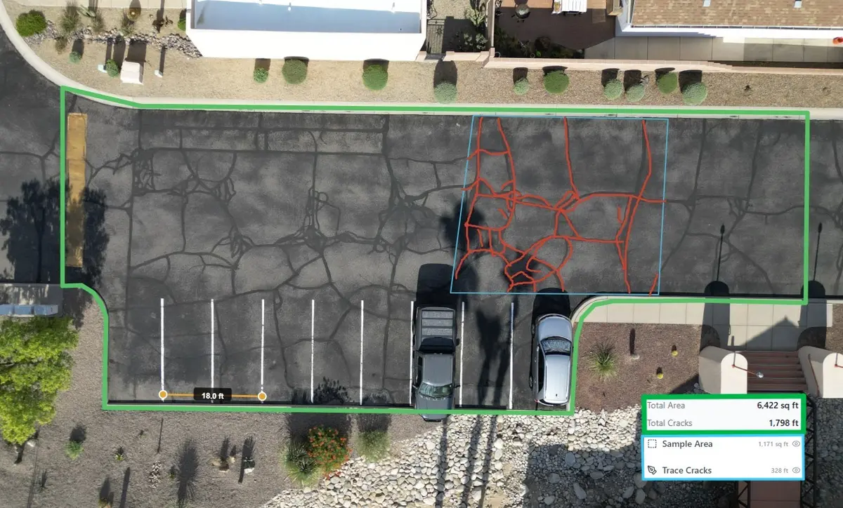 LineStriper AI measuring mode showing pavement area and projected crack length